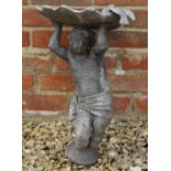 A LEAD BIRD BATH in the form of a putti supporting a shell with a bird perched on the edge, 35cm