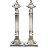 A PAIR OF MODERN WHITE METAL TABLE LAMPS of reeded column form, on square bases, each 62cm high (2)