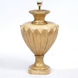 AN ITALIAN GILDED TABLE LAMP of baluster form, 60cm high together with two similar candlesticks,