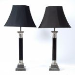 A PAIR OF MODERN SILVERED METAL AND FLUTED WOODEN COLUMNED TABLE LAMPS 65.5cm high to the fitting