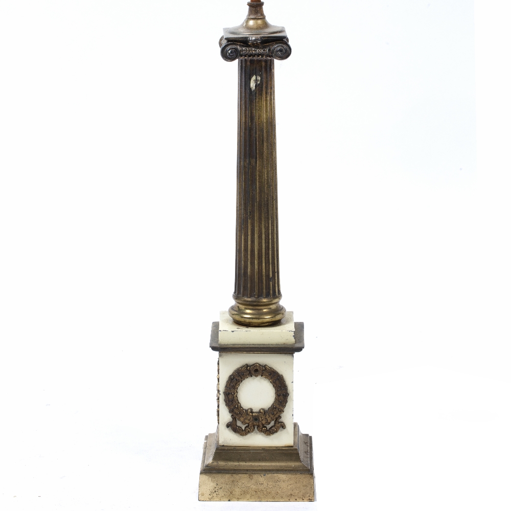 A BRASS AND PAINTED METAL TABLE LAMP in the form of classical fluted column, the plinth base set