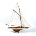 A MODERN RIGGED MODEL OF A SAILING YACHT 113cm long x 123cm high overall