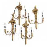 A SET OF FOUR 19TH CENTURY CARVED GILT WOOD WALL LIGHTS each with twin scrolling branches
