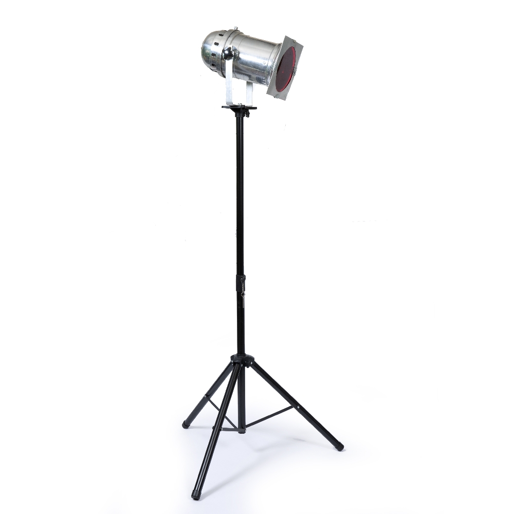 A CHROME THEATRE OR STUDIO LIGHT with a red filter and mounted on an adjustable stand, the light