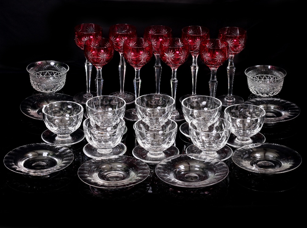 A SET OF EIGHT WATERFORD SUNDAE GLASSES with faceted bowls and integral stands 10cm diameter x 8cm