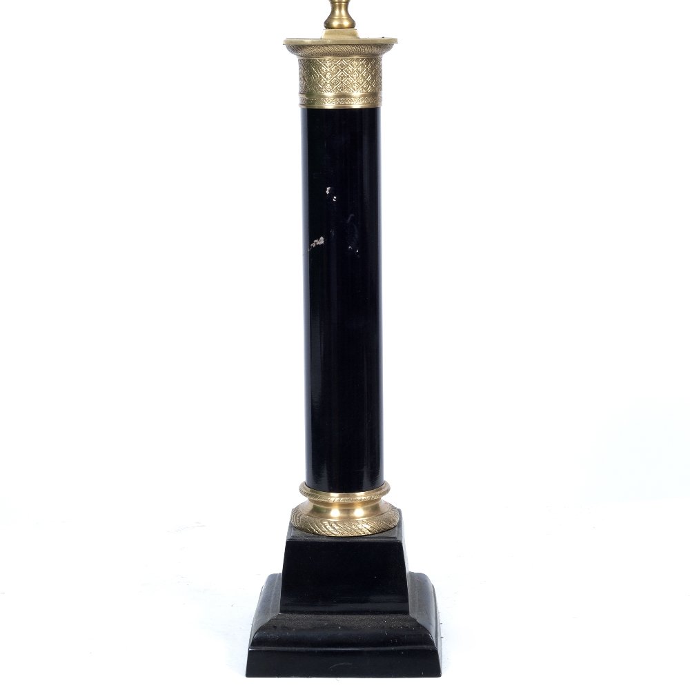 AN EMPIRE STYLE BLACK PAINTED TABLE LAMP in the form of a column on a square base, the base 18.5cm