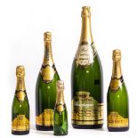 A GRADUATED SET OF FIVE GOSSET CHAMPAGNE DISPLAY BOTTLES ranging from quarter of a bottle to a