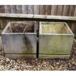 A PAIR OF SQUARE RECONSTITUTED STONE GARDEN PLANTERS 45cm wide x 42cm high (2) At present, there