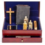 A VAMPIRE HUNTING KIT contained within a box with opening lid to the top and drawer to the front,