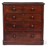 A VICTORIAN MAHOGANY CHEST OF TWO SHORT AND THREE LONG DRAWERS with turned knob handles and plinth