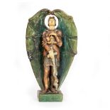 A COMPTON POTTERS GUILD SCULPTURE OF ST MICHAEL with flaming sword and scales of justice, and with