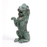 A CONTEMPORARY CAST BRONZE SCULPTURE of a lion rampant, 27cm high Condition: one leg slightly