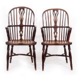 A PAIR OF 19TH CENTURY YEW AND ELM WINDSOR ARMCHAIRS with pierced splat backs and carved seats,