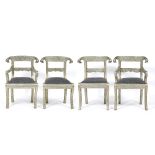 A SET OF FOUR GEORGIAN STYLE EMBOSSED WHITE METAL COVERED DINING CHAIRS with scrolling foliate