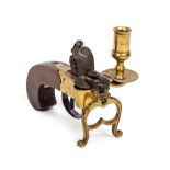 AN 18TH CENTURY STYLE BRASS AND HARDWOOD FLINTLOCK TINDER LIGHTER with candle socket, flint lock