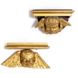 TWO SIMILAR GILT CHERUB CARVED WOOD WALL BRACKETS the largest 29cm wide x 13cm high Condition: