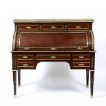 A 19TH CENTURY NAPOLEON III MAHOGANY CYLINDER BUREAU in the Louis XVI style with cast metal mounts