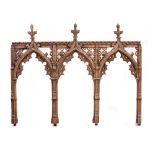 A 19TH CENTURY OAK GOTHIC REVIVAL REREDOS OR ROOD SCREEN in three sections, with pierced fretwork