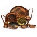 A COLLECTION OF MIDDLE EASTERN COPPER AND BRASS ITEMS consisting of two jugs, a vessel with large