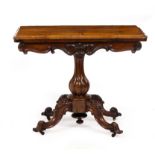 A VICTORIAN ROSEWOOD FOLD OVER CARD TABLE