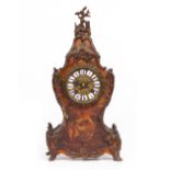 A 19TH CENTURY CONTINENTAL VERNIS MARTIN PAINTED METAL MOUNTED MANTLE CLOCK the shaped case