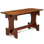 A RECTANGULAR OAK SERVING TABLE with moulded edge, shaped end supports and pegged stretcher, 140cm