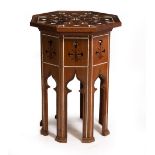 AN EGYPTIAN REVIVAL OCTAGONAL BONE AND BRASS INLAID TABLE 57.5cm x 58cm x 77cm the octagonal top