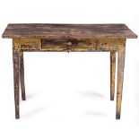 A RUSTIC OAK RECTANGULAR SIDE TABLE with single frieze drawer and standing on square tapering
