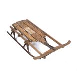 AN OLD ASH AND WROUGHT IRON TOBOGGAN 47.5cm wide x 73cm long At present, there is no condition