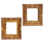 A PAIR OF GILT RECTANGULAR WALL MIRRORS with 19th century carved frames and later mirror plates,