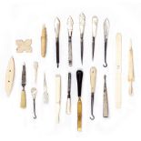 A SMALL COLLECTION OF NEEDLEWORK AND WORKBOX TOOL to include button hooks, a needlecase in the