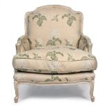 A CONTEMPORARY CREAM PAINTED UPHOLSTERED ARMCHAIR of deep proportions, 80cm wide x 92cm deep x