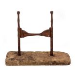 A GEORGIAN OR LATER WROUGHT IRON BOOT SCRAPER set into a York stone rectangular small slab, the slab
