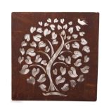 A PIERCED STEEL WALL PANEL depicting a leafy tree with bird flying above, 91.5cm square At