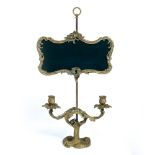 A FRENCH ORMOLU ADJUSTABLE TABLE SCREEN with Rococo style acanthus scrolling twin branch candelabra,