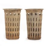 A PAIR OF CIRCULAR GALVANIZED PIERCED PLANTERS 39cm diameter x 59cm high (2) Condition: marks, dents