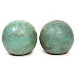 A PAIR OF TERRACOTTA GLAZED GARDEN BALLS OR FOUNTAIN ORNAMENTS 32cm diameter together with a