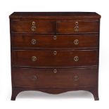 A MAHOGANY BOW FRONTED CHEST OF TWO SHORT AND THREE LONG DRAWERS with splayed bracket feet, 100cm