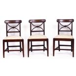 A SET OF EARLY 19TH CENTURY BAR BACK DINING CHAIRS with X shaped splats, inset seats and square