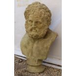 A CAST RECONSTITUTED STONE BUST OF HERCULES 66cm wide x 98cm high Condition: chip to the front of