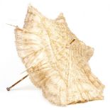 A CONTINENTAL SILK PARASOL with white metal enamel decorated engine turned decoration, 99cm long