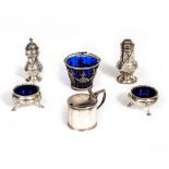 A WILLIAM IV DRUM MUSTARD POT with stags head crest and shell cast thumb piece, with blue glass