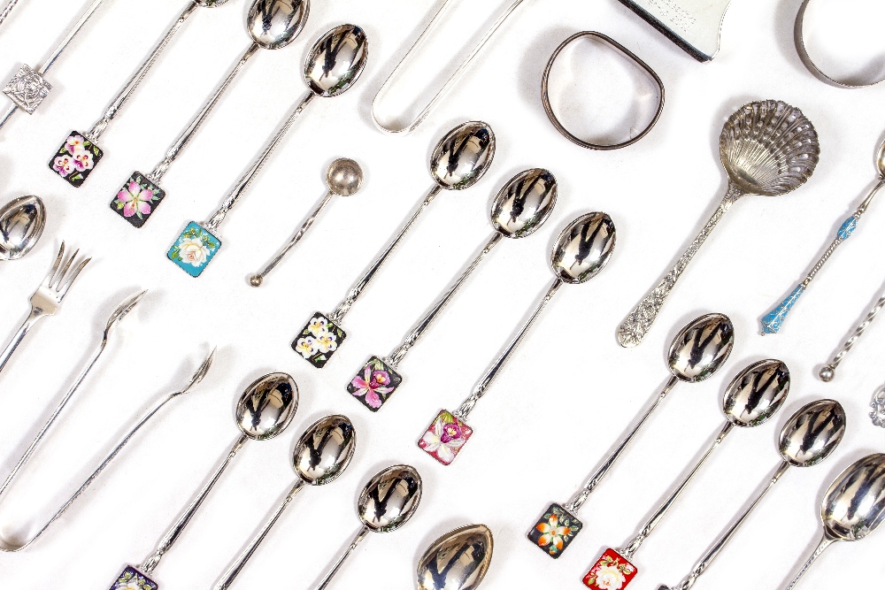 A SMALL GROUP OF WHITE METAL SPOONS some silver, some marked stirling, approximately 106 grams in