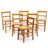 A SET OF SIX CHILDREN'S BEECHWOOD CHAIRS with solid seats, 31cm wide x 60cm high Condition: marks,