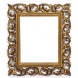 A SMALL RECTANGULAR WALL MIRROR with a carved wood gilt painted Venetian style frame and later