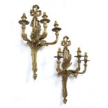 A PAIR OF 18TH CENTURY STYLE ORMOLU THREE BRANCH WALL LIGHTS with ribbon tied decoration and