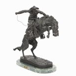 AFTER FREDERICK SACKRIDER REMINGTON (1861-1909) 'Bronco Buster', bronze, signed to the base and