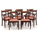 A SET OF REGENCY MAHOGANY DINING CHAIRS in the manner of Gillows, with brass inlaid backs, inset