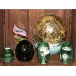 THREE VICTORIAN GREEN GLASS DUMP PAPERWEIGHTS, two 12cm high, one 7cm high; a further bubble glass