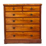 A VICTORIAN MAHOGANY CHEST OF TWO SHORT AND FOUR LONG GRADUATED DRAWERS with plinth base, 129cm wide